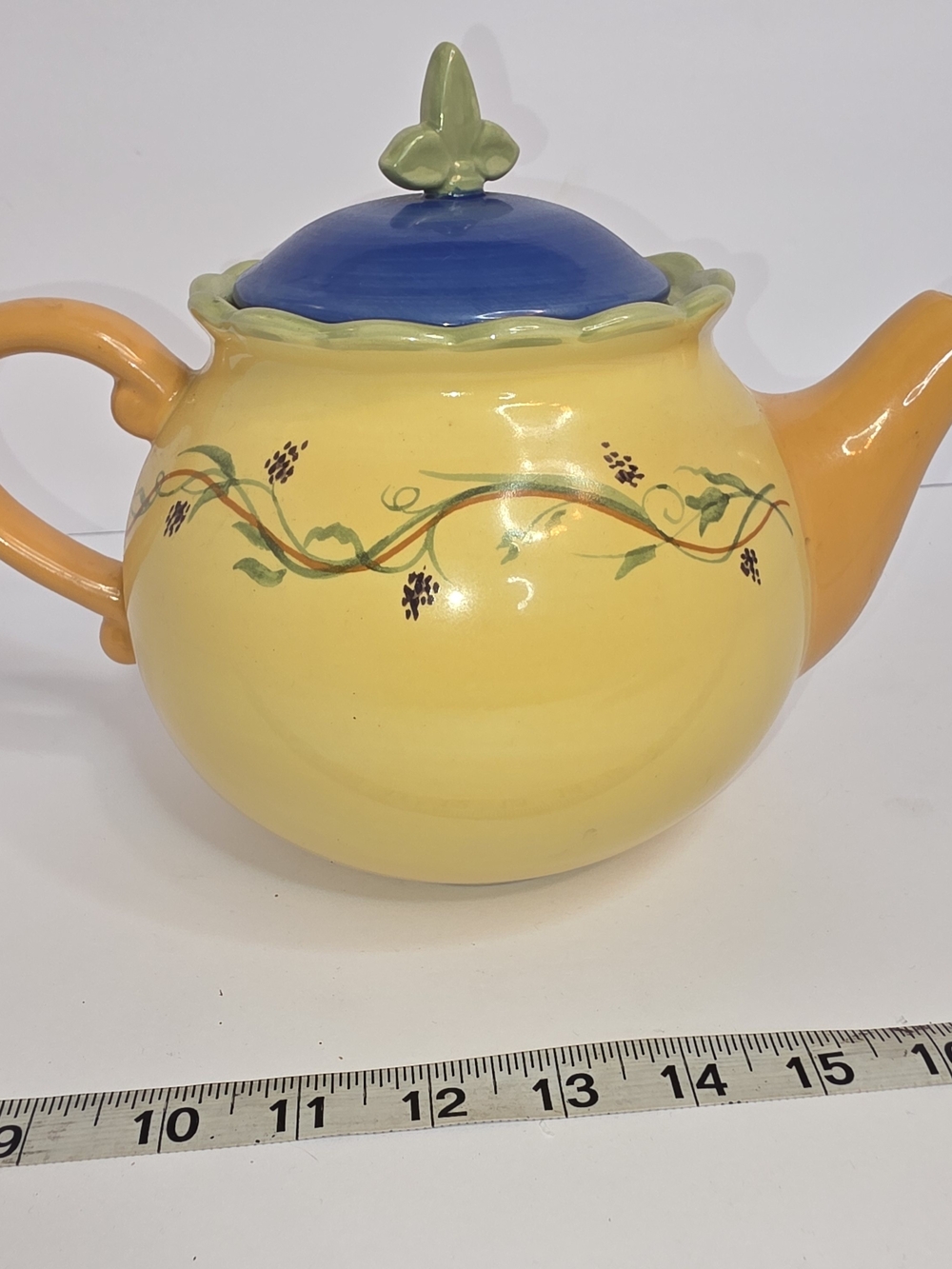 Pfaltzgraff Yellow Ceramic Teapot with Blue Lid and Green Accents